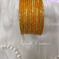 Turmeric Oval Dot And Criss Cross sparkle Glass Bangles for Girls, Teens, Women